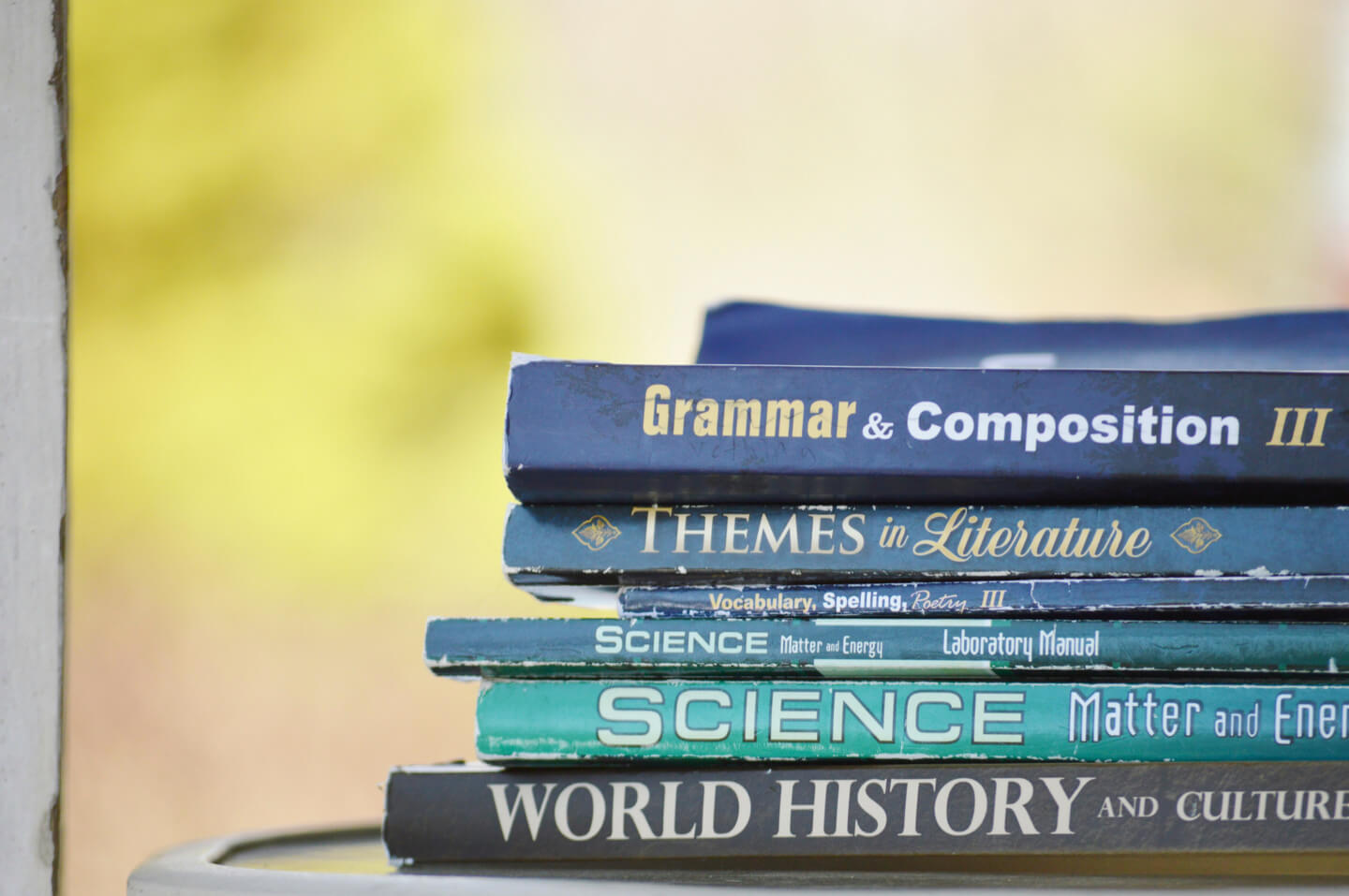 A stack of school textbooks